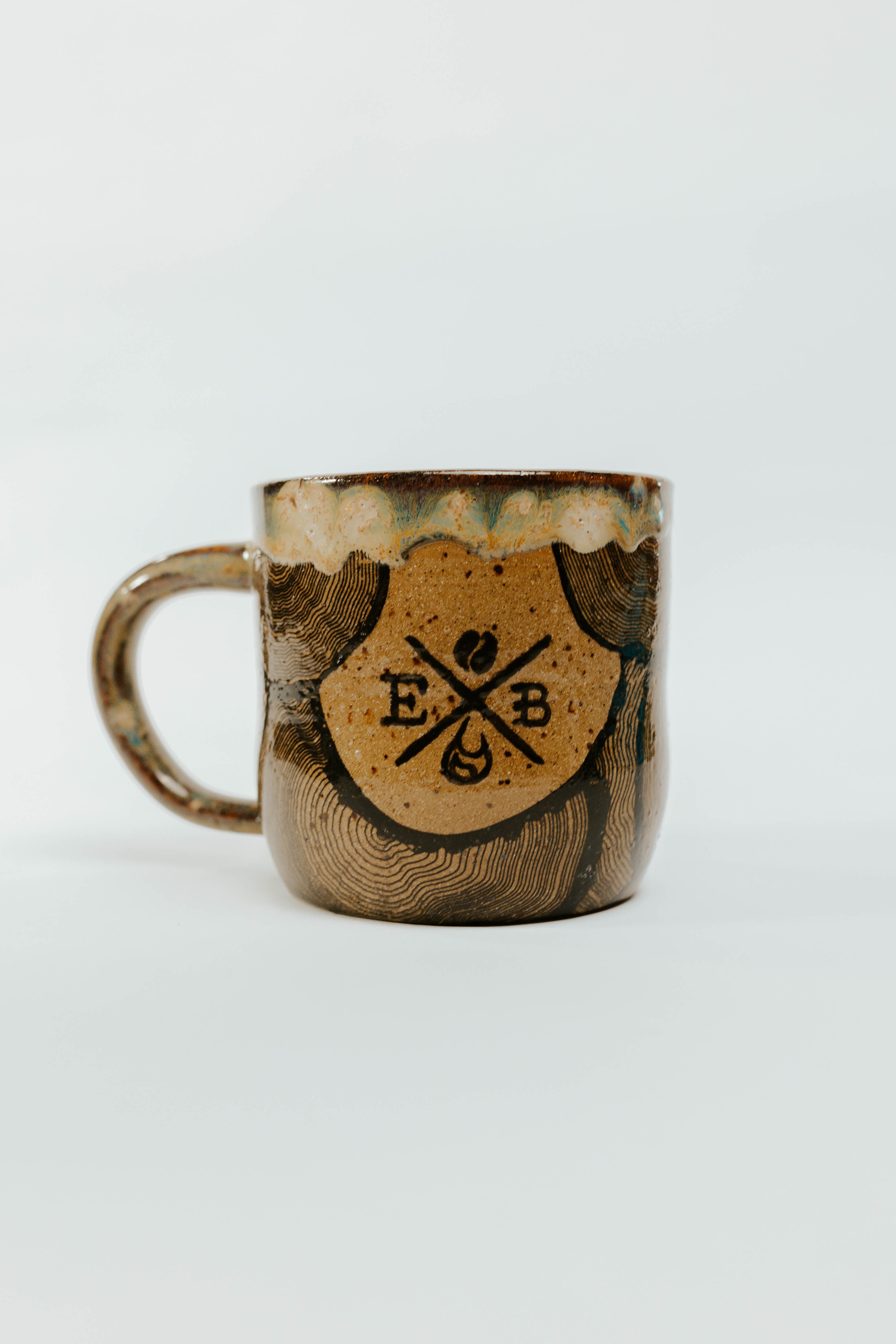 http://emberandbeanroasting.com/cdn/shop/files/TREELINEMUG.jpg?v=1695251385